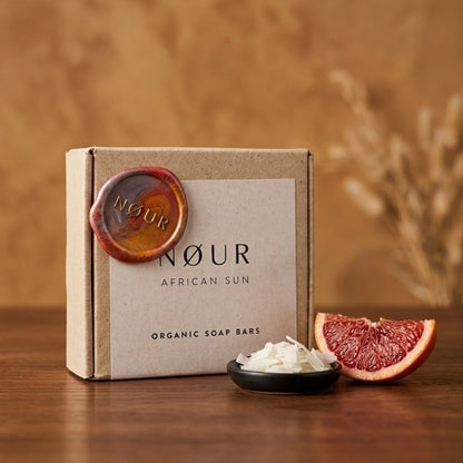 Verpackung von African Sun mit Kokosflocken und Orangenstück